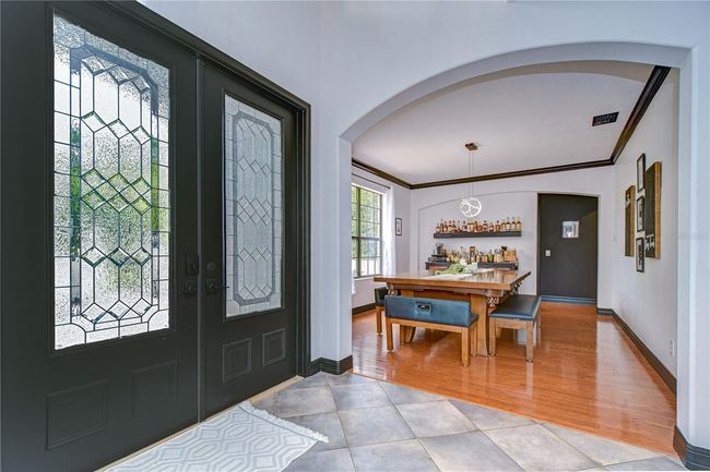The formal dining room sits just off the entry with tons of room to entertain guests! | Image 13