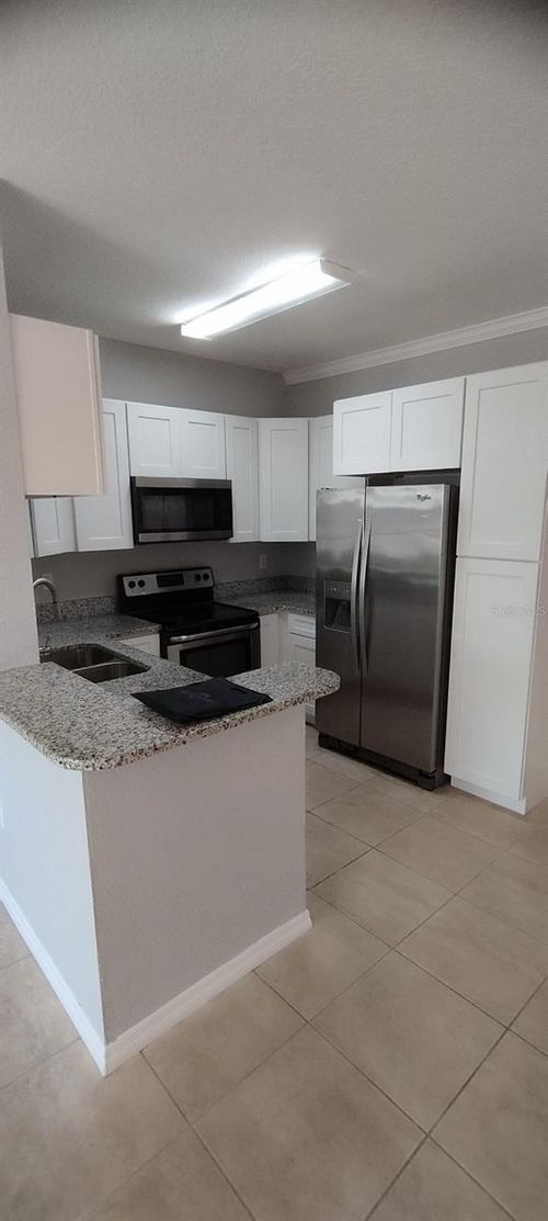 825-2544 Robert Trent Jones Dr, ORLANDO, FL, 32835-6280 | Card Image