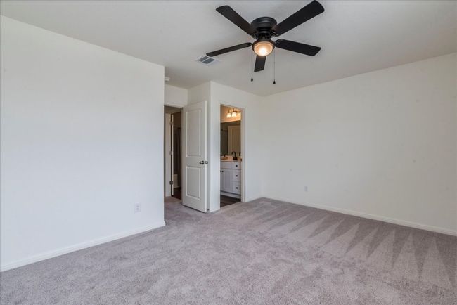 Bedroom 2 with door connecting to upstairs guest bath | Image 24