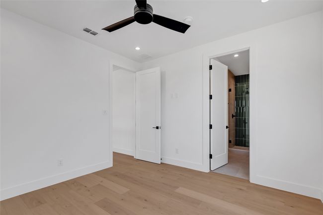 Unfurnished bedroom with light wood-style floors, recessed lighting, and ceiling fan | Image 35