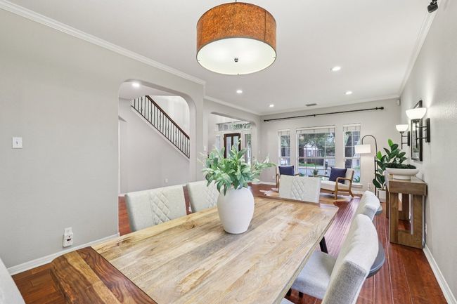 Everyday meals and special occasions feel elevated in this sunlit dining space. | Image 7