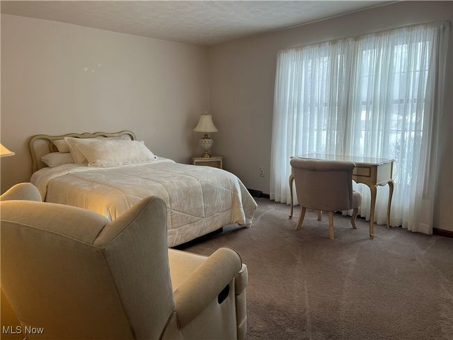 Carpeted Bedroom on the First Floor. | Image 20