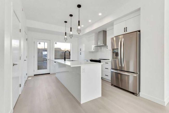 322 Sage Hill Circle Nw, Townhouse with 4 bedrooms, 5 bathrooms and 3 parking in Calgary AB | Image 4