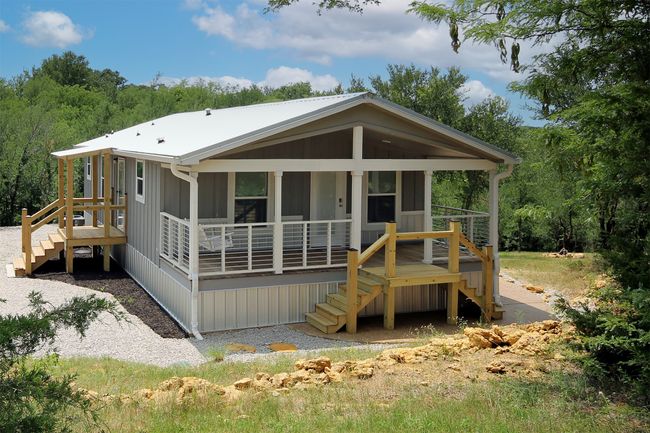 2020 Modular Home with Lake Views. 966 Square Feet of Interior Living Space with 1 Living Area, Kitchen, 2 Bedrooms, 2 full Baths, and Utility/Mud Room. Offers a comfortable space as a temporary residence while you build, a weekend or full-time residence, a guest home, or an Airbnb | Image 20