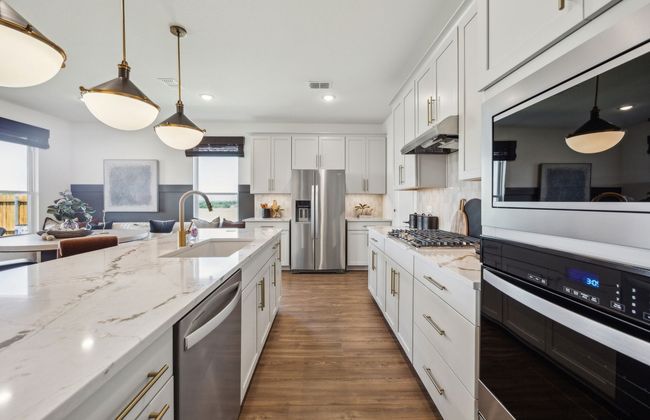 Gourmet kitchen designed for culinary excellence and entertaining *Model representation | Image 5