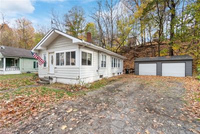 View of front of property with an outbuilding and a garage | Image 3