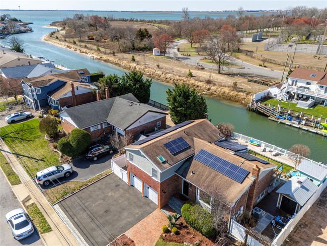 Drone / aerial view featuring a residential view and a water view | Image 39