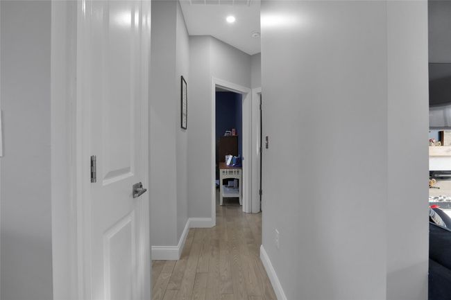 Corridor featuring light wood-type flooring | Image 18