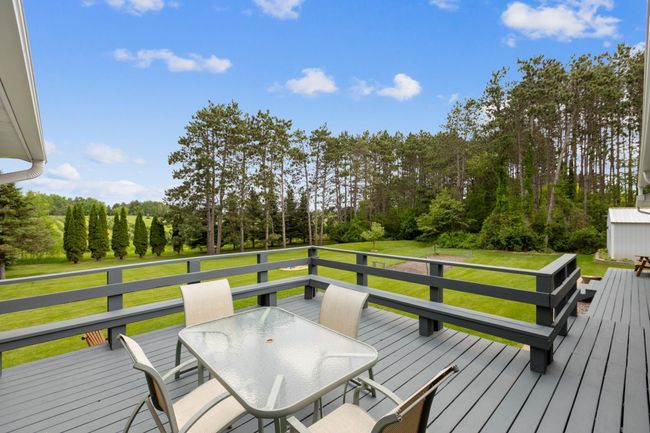 Huge deck overlooks a picture perfect back yard complete with wildlife. | Image 31