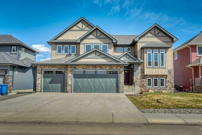 312 Boulder Creek Cres Se, House other with 3 bedrooms, 3 bathrooms and 6 parking in Langdon AB | Image 43