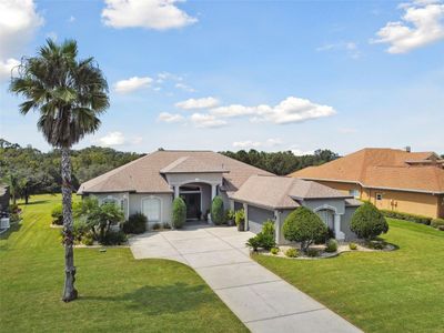 34219 Sahalee Loop, House other with 3 bedrooms, 3 bathrooms and null parking in Dade City FL | Image 2