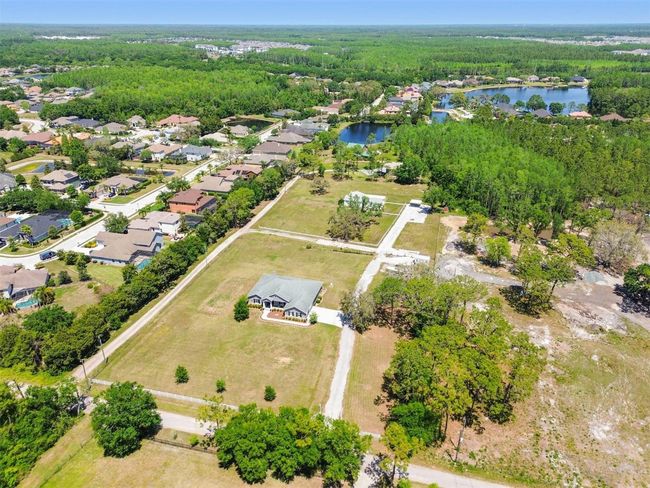 15513 Phillips Rd, House other with 4 bedrooms, 3 bathrooms and null parking in ODESSA FL | Image 76