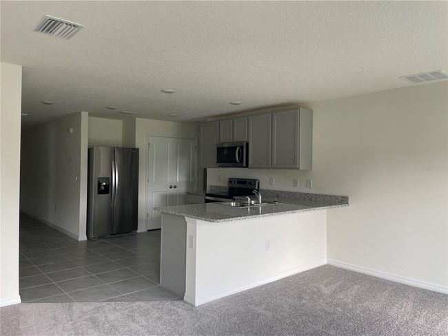 7946 Broad Pointe Dr, House other with 3 bedrooms, 2 bathrooms and null parking in ZEPHYRHILLS FL | Image 4