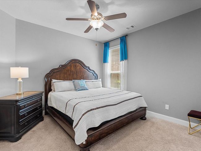 Second primary bedroom located on first floor. | Image 28