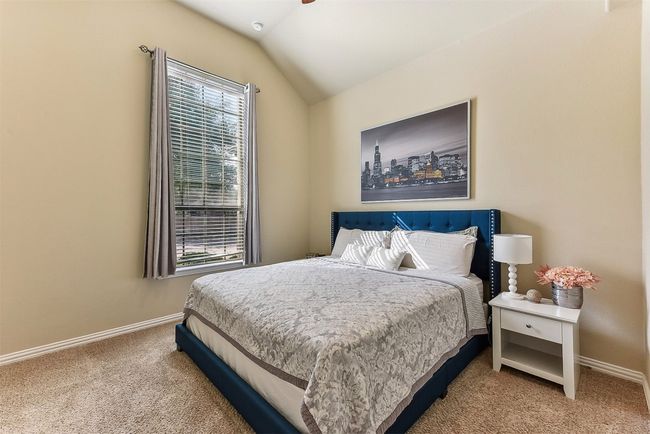 Each guest bedroom offers its own sense of space and comfort—ideal for visitors, kids, or creative setups like a home gym or hobby room | Image 21