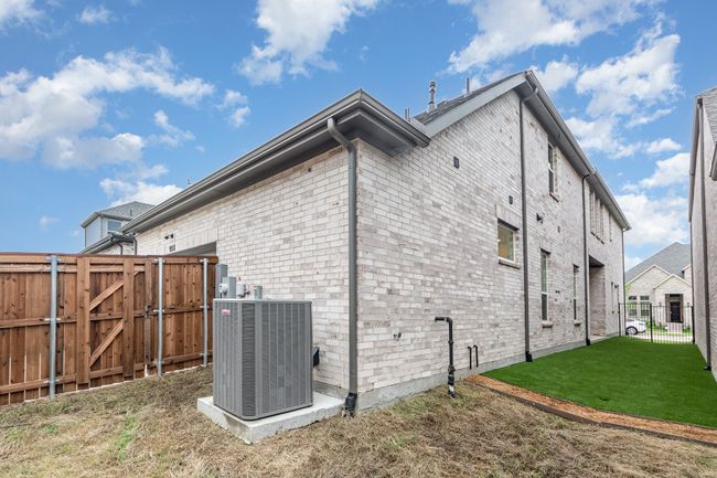 View of side of property with a gate and a fenced backyard | Image 35