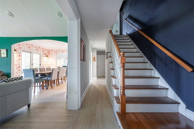 Staircase to second floor primary suite | Image 18