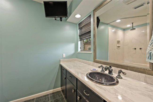 Primary Bath En Suite with gorgous patinaed luxery hardware and custom cabinets | Image 19