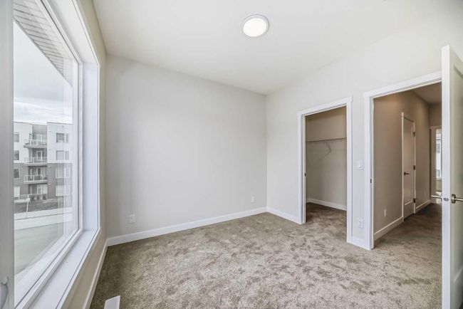 214 Shawnee Square Sw, Townhouse with 2 bedrooms, 3 bathrooms and 3 parking in Calgary AB | Image 27