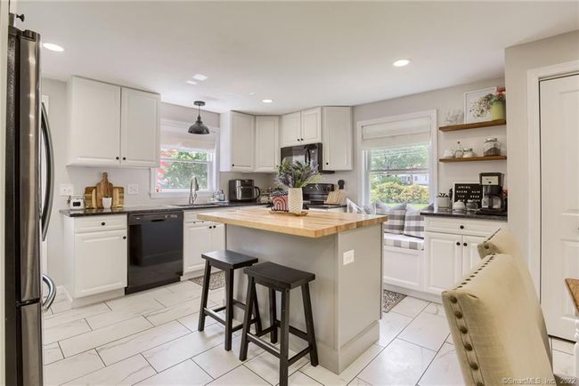Center Island and Window Seat with storage underneath | Image 11