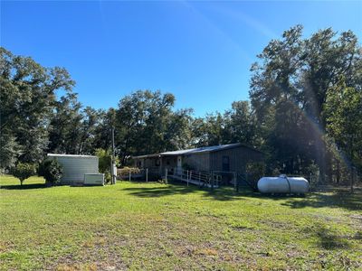 8650 Ne 106 Th Street, House other with 3 bedrooms, 2 bathrooms and null parking in BRONSON FL | Image 2