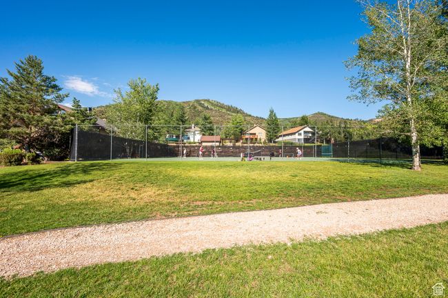 View of yard featuring fence and a mountain view | Image 43