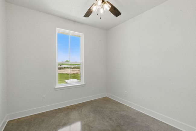 Empty room with baseboards and ceiling fan | Image 19
