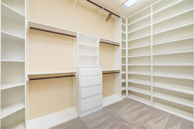 Enjoy a closet that feels more like a personal boutique—custom storage makes it easy to keep everything in its place, with plenty of room to grow your wardrobe and start each day feeling effortlessly organized. | Image 18