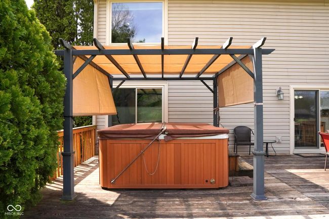 exterior space with a hot tub | Image 30