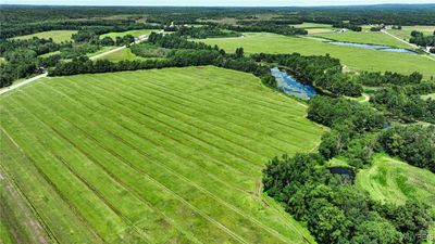 Field 3 with fields 1&2 in the distance to the right and field 7 visible towards the back left corner. Miller creek flows between Fields 1 and 3 and Gardner creek flows between Fields 1&2. | Image 2