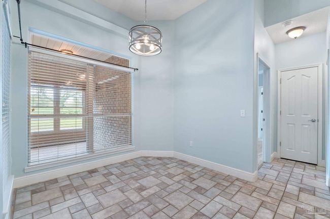 7008 Turnberry Cir, House other with 4 bedrooms, 2 bathrooms and 3 parking in Navarre FL | Image 25