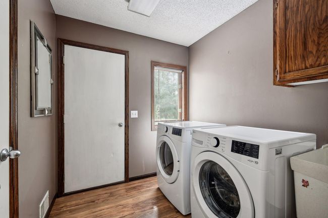 The main floor 3/4 bath has a neutral décor | Image 12