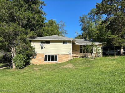 Rear view of house featuring a yard | Image 1