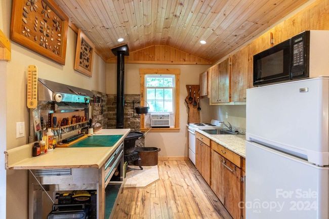 Kitchen with Wood Stove | Image 27