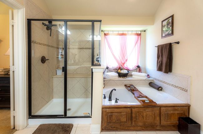 Full bath with a garden tub and a shower stall | Image 24