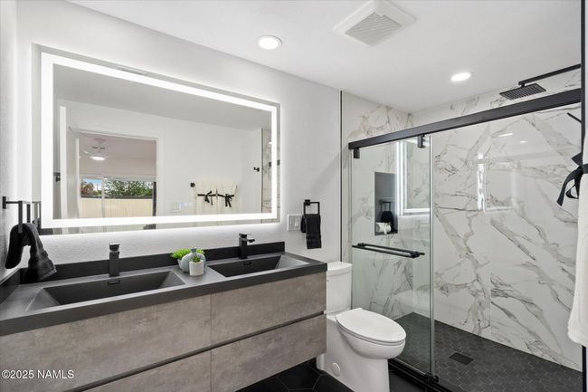 Beautifully updated primary bathroom | Image 17