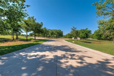 Surrounding community featuring a lawn | Image 3