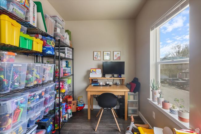 Office space with baseboards and wood finished floors | Image 14
