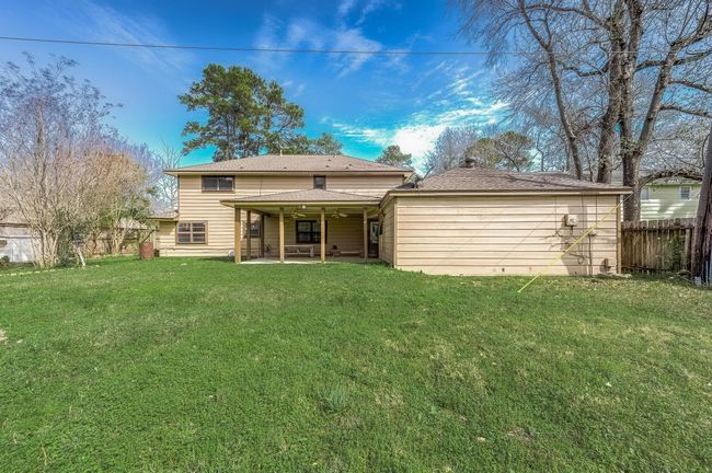 Expansive backyard space, perfect for any needs. | Image 37