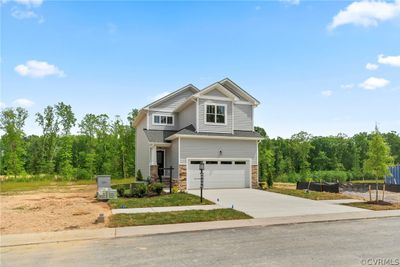 Craftsman-style house with a garage | Image 2