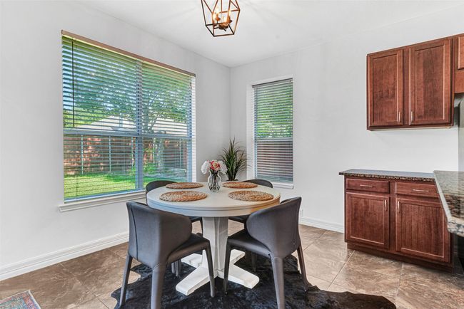 breakfast room with view of backyard | Image 14