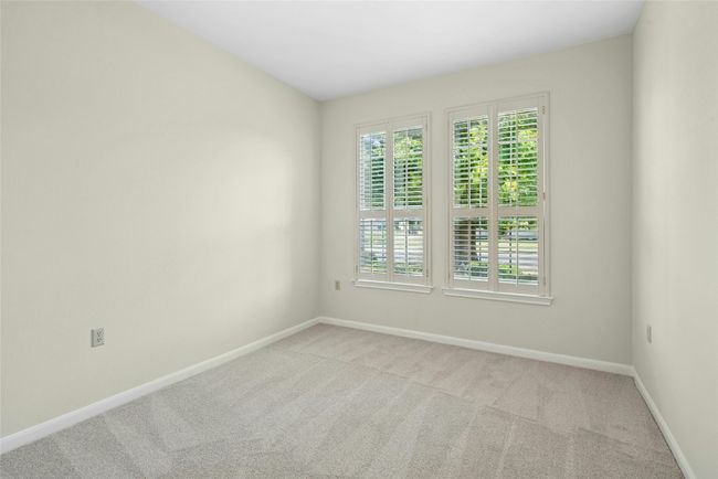 Carpeted empty room with baseboards | Image 13