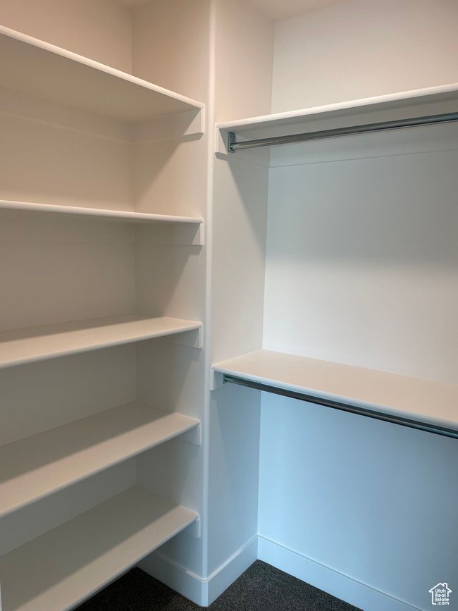 Walk in closet with carpet | Image 18