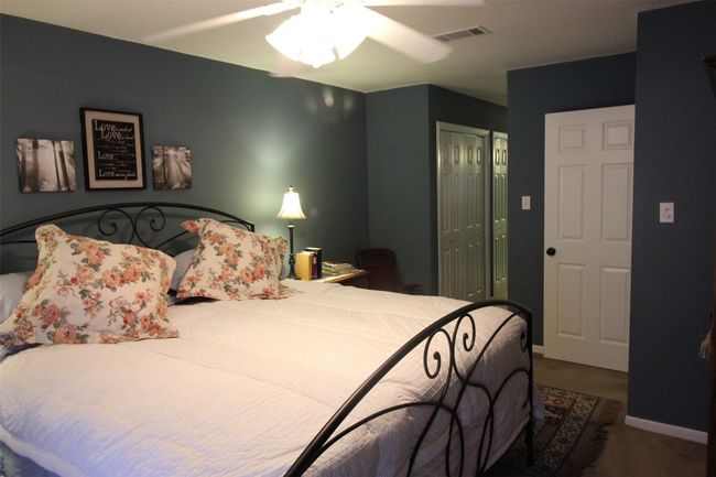 Bedroom featuring a closet and ceiling fan | Image 20
