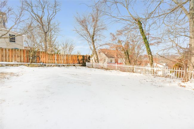 Snowy yard with fence private yard | Image 20