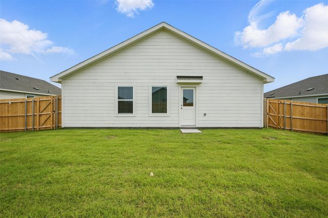 Back of property with a fenced backyard | Image 20