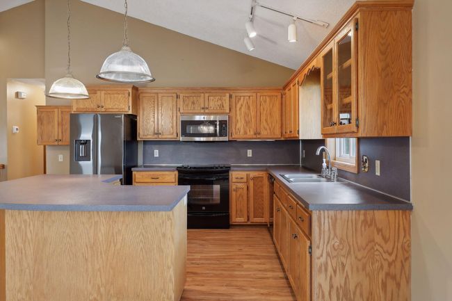 Kitchen with stainless appliances | Image 11
