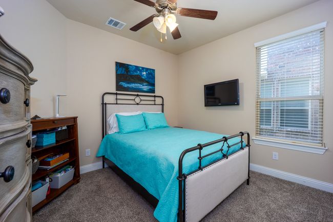 DownstairsBedroom with carpet flooring and ceiling fan | Image 15