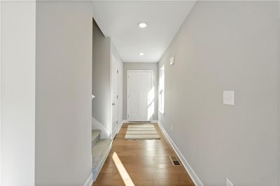 Doorway featuring hardwood / wood-style flooring | Image 2