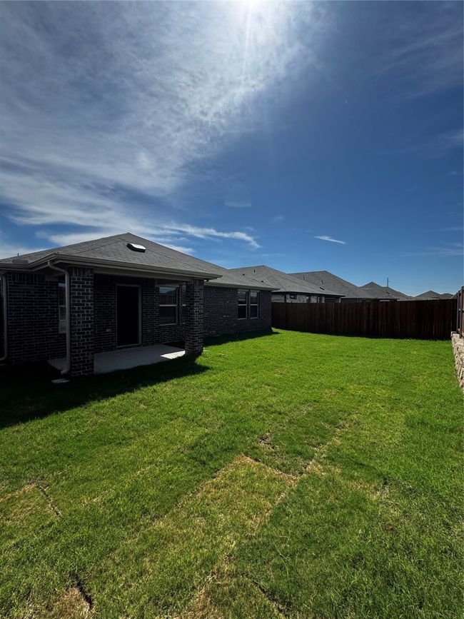 View of yard with a​​‌​​​​‌​​‌‌​‌‌​​​‌‌​​‌‌​‌​​​​​‌ patio | Image 22